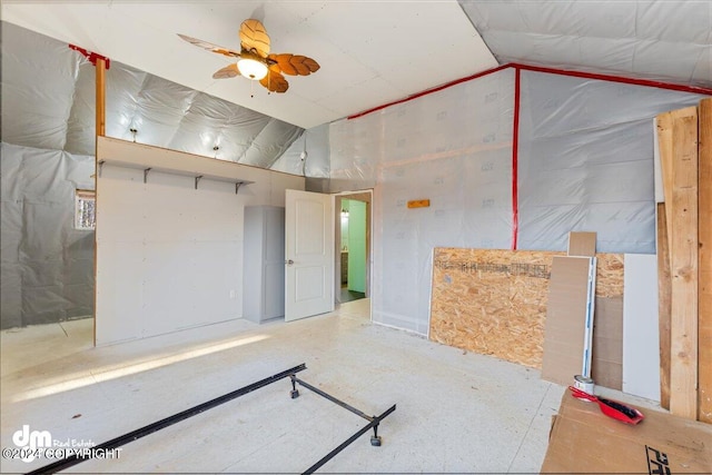 miscellaneous room featuring ceiling fan and vaulted ceiling