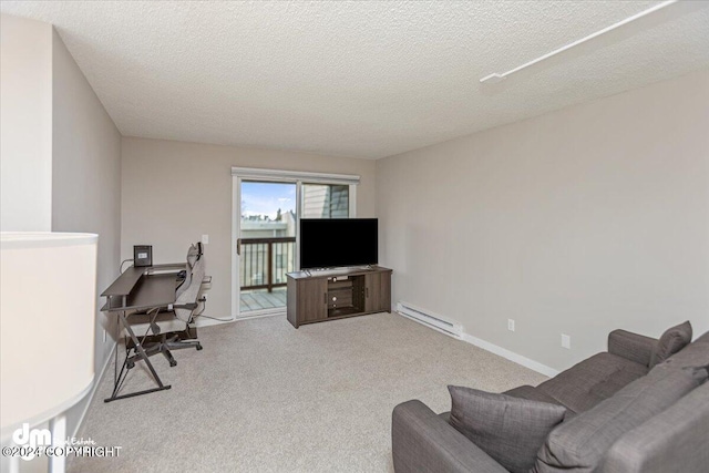 home office featuring light carpet, a textured ceiling, and a baseboard radiator