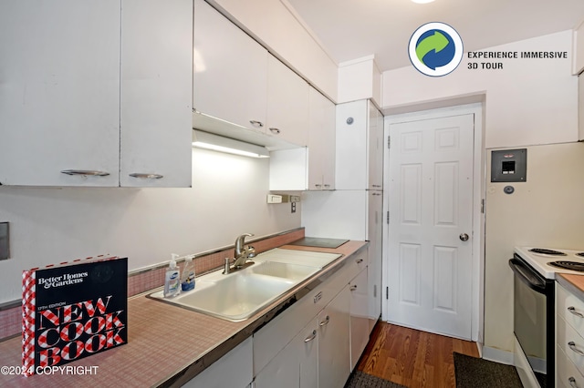 kitchen with white cabinetry, white electric stove, dark hardwood / wood-style floors, and sink