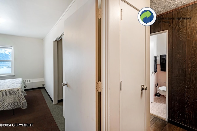 hallway featuring dark wood-type flooring