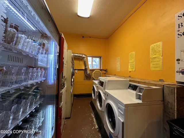 washroom with washing machine and dryer