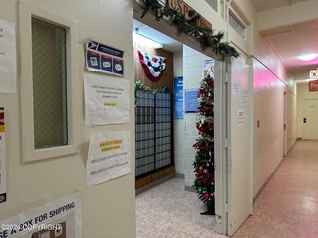 corridor featuring mail boxes