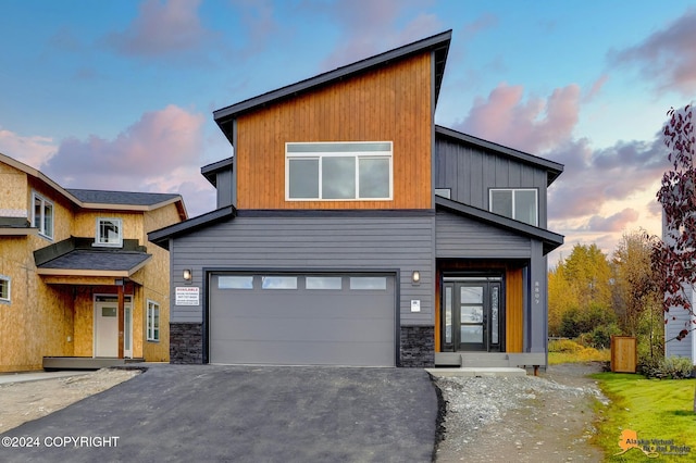 contemporary house featuring a garage