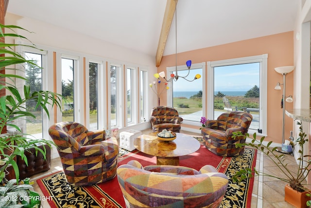 sunroom / solarium with lofted ceiling with beams and plenty of natural light