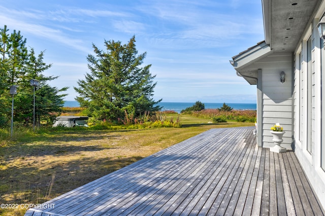 deck featuring a water view