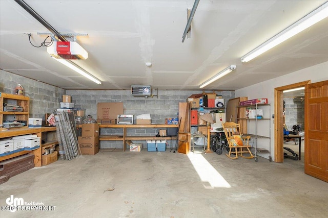 garage featuring a garage door opener