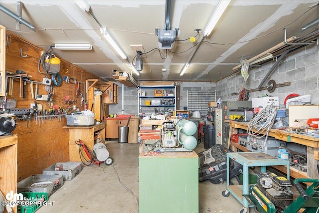 interior space featuring a workshop area and concrete floors