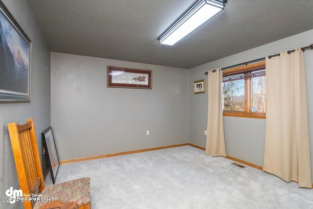 interior space with a textured ceiling