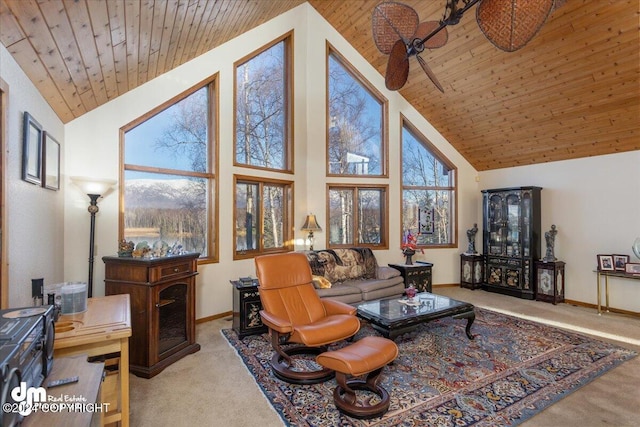 living room with a wealth of natural light, light carpet, and high vaulted ceiling