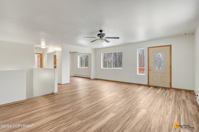 interior space featuring light hardwood / wood-style floors, a baseboard radiator, and ceiling fan