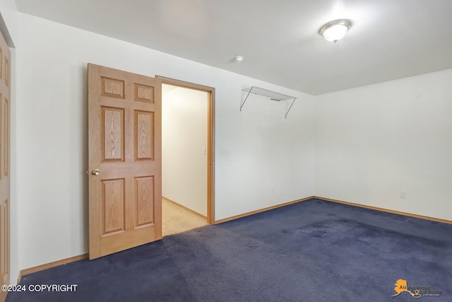 bonus room featuring light colored carpet