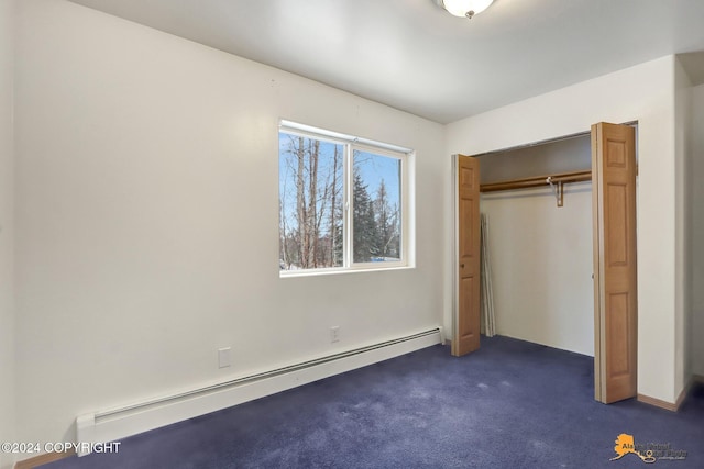 unfurnished bedroom with a closet, a baseboard radiator, and dark carpet