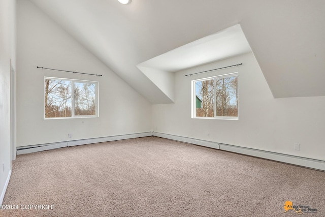 bonus room with lofted ceiling, a healthy amount of sunlight, and carpet flooring