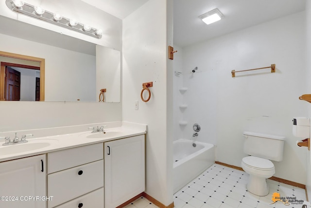 full bathroom with vanity, toilet, and washtub / shower combination