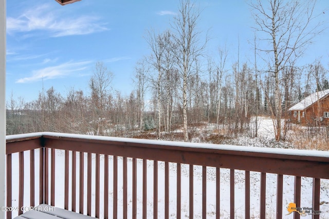 view of snow covered deck