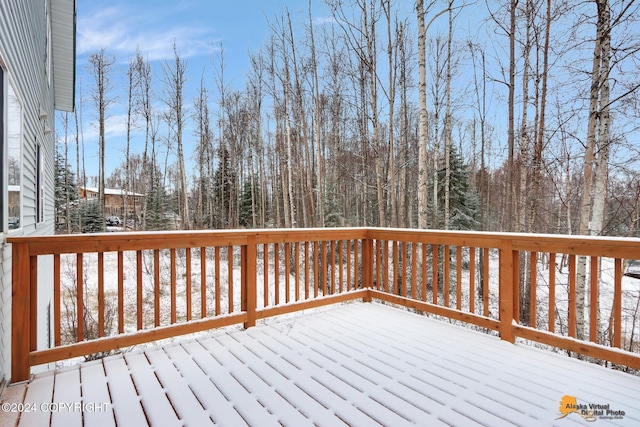 view of snow covered deck