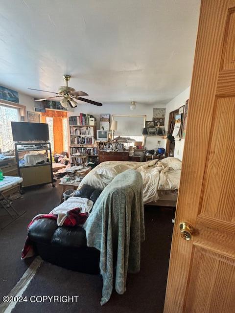 bedroom featuring ceiling fan