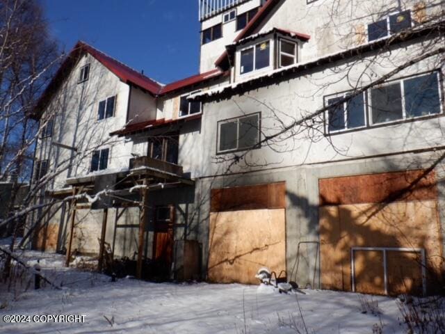 view of snow covered property