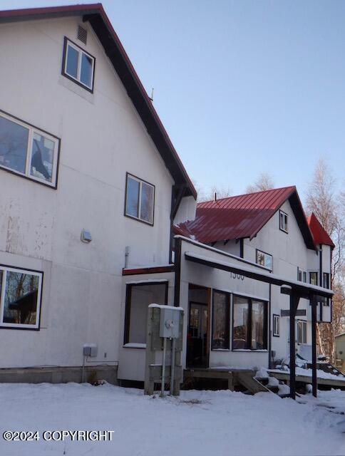 view of snow covered property