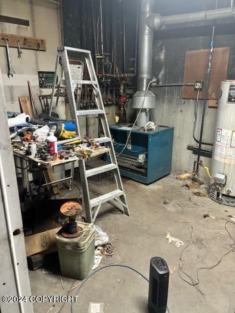 utility room featuring gas water heater