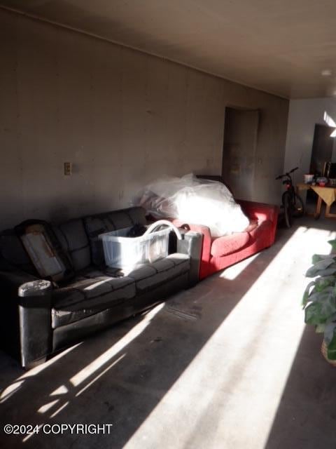 living room with concrete floors