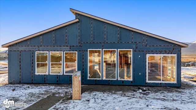 view of snow covered property