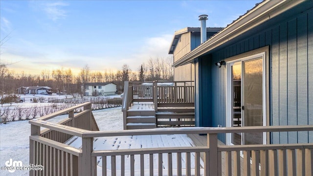 view of snow covered deck