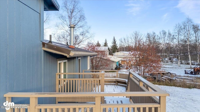 view of snow covered deck