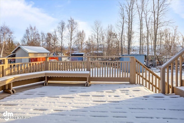 view of snow covered deck