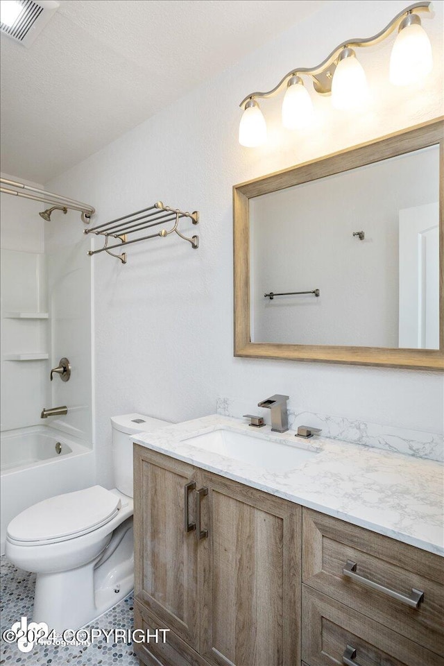 full bathroom featuring vanity, toilet, tile patterned floors, and tub / shower combination