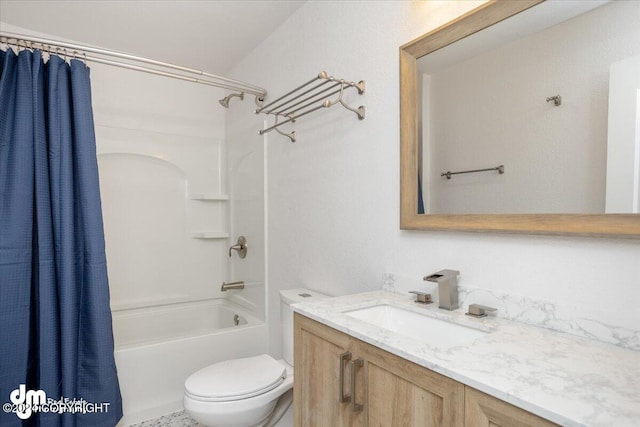 full bathroom with vanity, shower / tub combo with curtain, and toilet