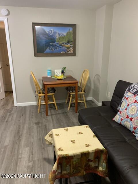 dining room with hardwood / wood-style floors