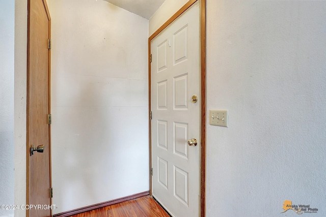 interior space with hardwood / wood-style floors