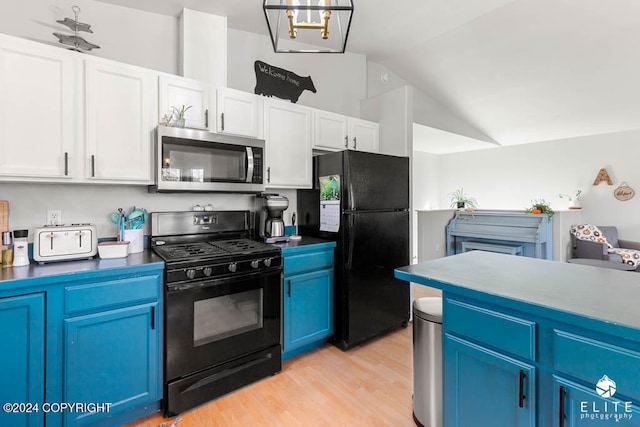 kitchen featuring black appliances, light wood-type flooring, white cabinets, blue cabinets, and lofted ceiling