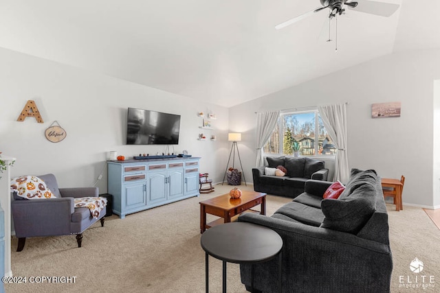 living room with vaulted ceiling, light carpet, and ceiling fan