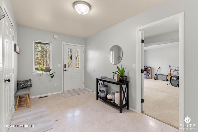 view of carpeted entryway