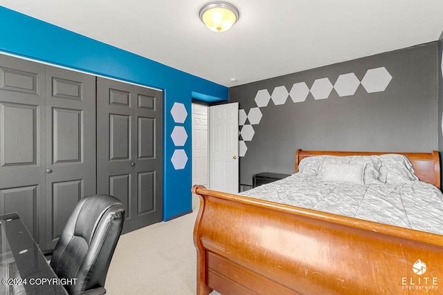 carpeted bedroom with a closet