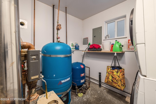 utilities with stacked washer / dryer and electric panel