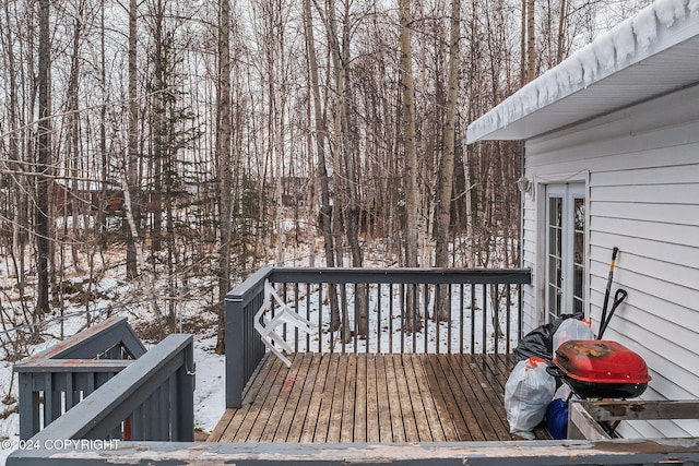 view of snow covered deck