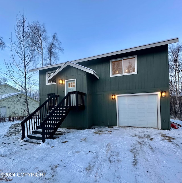 view of front of property with a garage