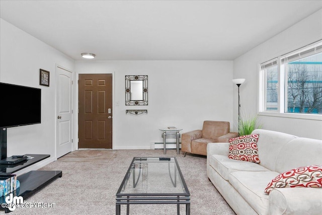 living room with baseboard heating and light carpet