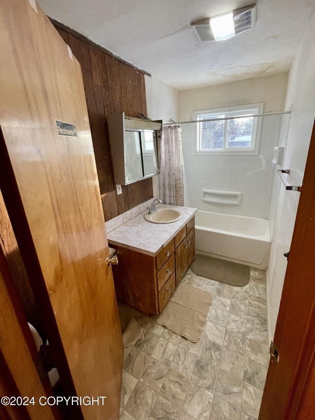 4312 E 6th Ave, Anchorage, AK 99508 - full bathroom with vanity and shower / bathtub combination with curtain