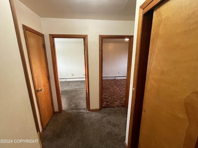 4312 E 6th Ave, Anchorage, AK 99508 - hallway featuring carpet floors and baseboard heating