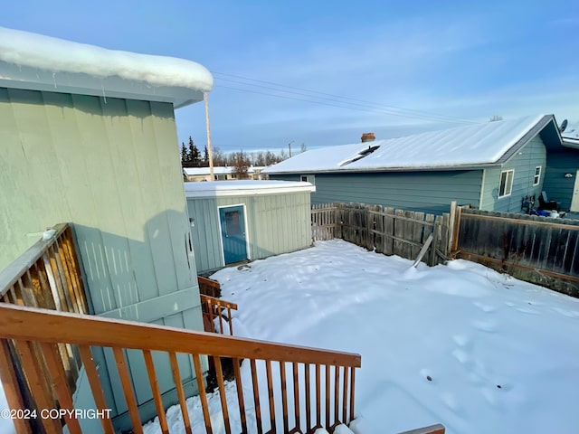 view of yard covered in snow