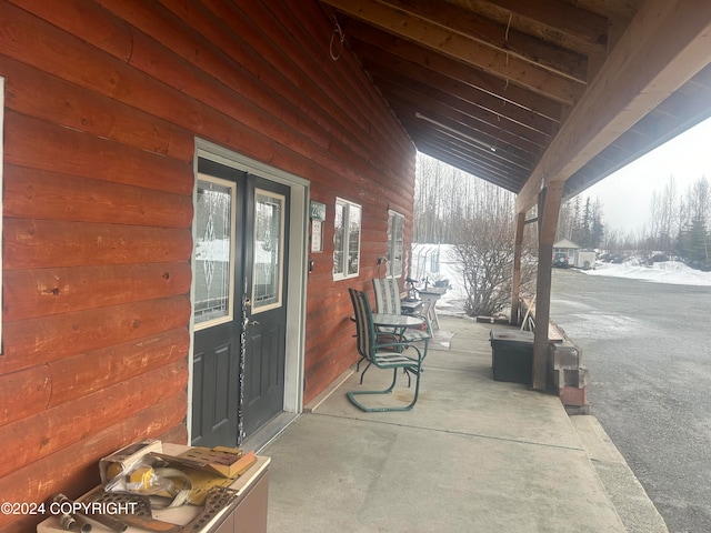 view of snow covered patio