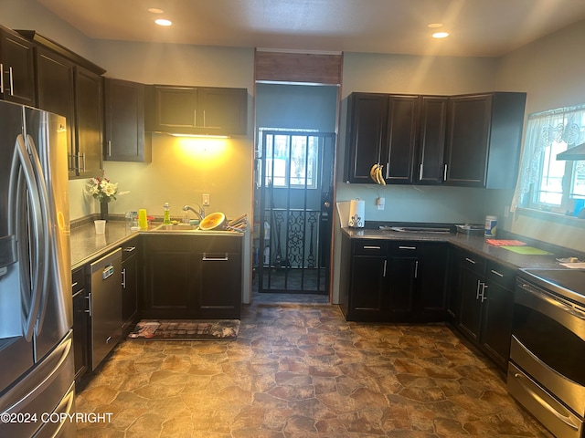 kitchen with sink and stainless steel appliances