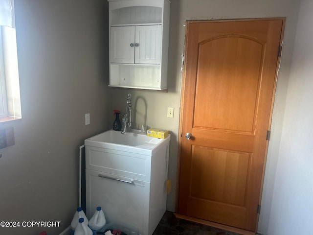 laundry area with sink