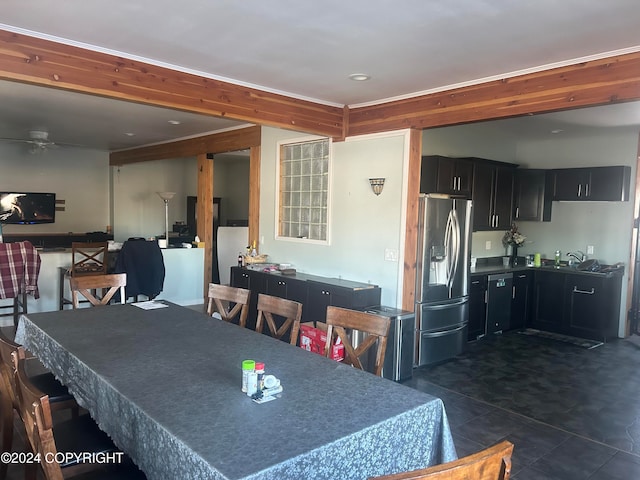 dining space with sink and ceiling fan