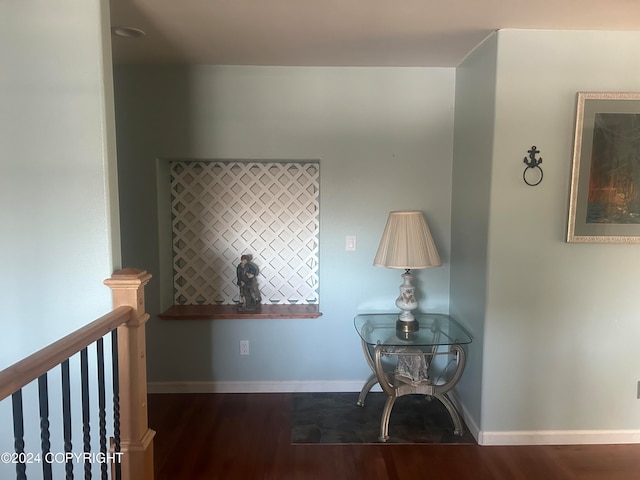 hallway featuring dark wood-type flooring