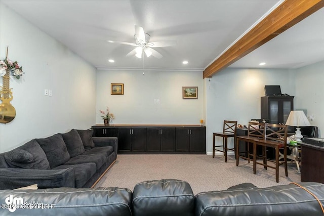 carpeted living room featuring ceiling fan